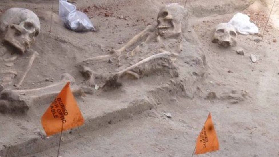 The black-holes and under-worlds of mass graves