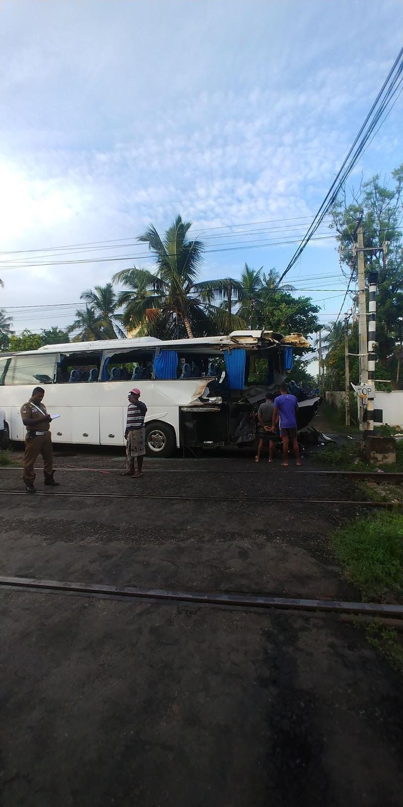 Bus full of tourists collide with train at unsafe crossing in Waskaduwa